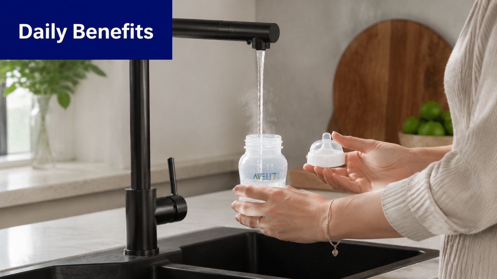 A person uses a modern boiling water tap to fill a baby bottle in a kitchen setting.