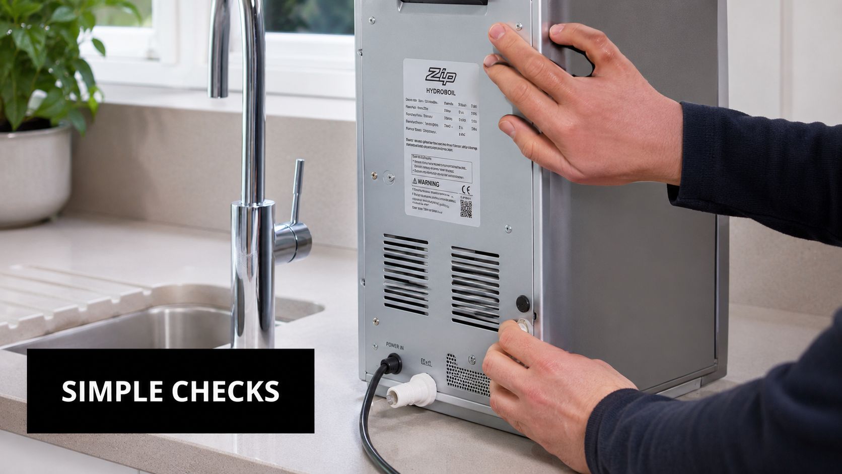 A service technician performing a routine check on a Zip Hydroboil unit on a kitchen countertop.